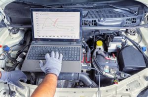 Mechanic Performing Car Maintenance