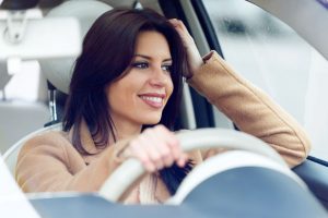 Woman Unfocused On Driving